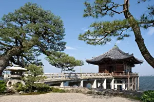 Walk Way Prints: Picturesque Ukimido Temple pagoda resting on stilts above Lake Biwa in Otsu