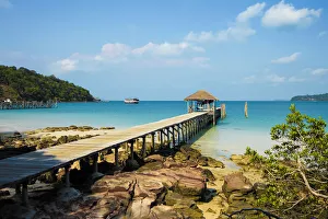 Traditionally Cambodian Prints: Pier at the beautiful white sand beach on this holiday island, Saracen Bay, Koh Rong