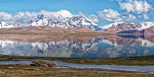 Pik Dankova peak reflecting in water, Tian Shan mountains at the Chinese border, Naryn province, Kyrgyzstan, Central Asia, Asia