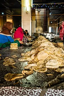 Stack Prints: A pile of fresh roti being sorted at the Golden Temple, Amritsar, Punjab, India, Asia