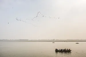 Passenger Prints: Pilgrims on a boat on the River Ganges, Varanasi, Uttar Pradesh, India, Asia