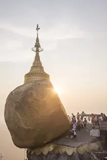 Pilgrims at Golden Rock Stupa (Kyaiktiyo Pagoda) at sunset, Mon State, Myanmar (Burma)
