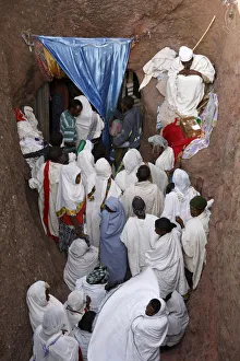 Pilgrims lining up to collect water from the Jordan River spring in Bieta Ghiorghis (St Pilgrims lining up to collect water from the Jordan River spring in Bieta Ghiorghis (St