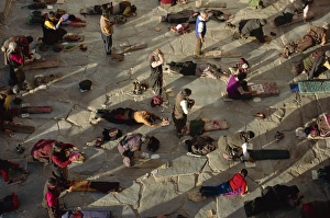 Tibetan Ethnicity Prints: Pilgrims prostrating, Jokhang Temple, Barkhor, Lhasa, Tibet, China, Asia