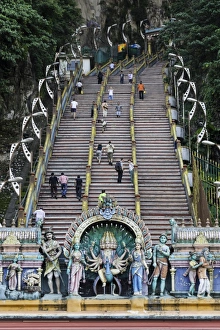 Malaysian Prints: Pilgrims and tourists walking up the steep steps to the Batu Caves, Gombak, Malaysia