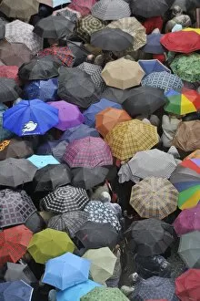 Pilgrims waiting in the rain for Pope Benedict XVI at Lourdes, Hautes Pyrenees