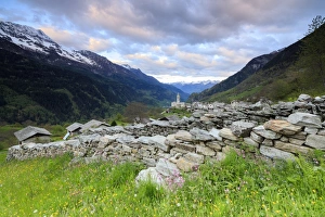 Soglio Prints: Pink clouds at dawn on the alpine village of Soglio, Maloja, Bregaglia Valley, Engadine