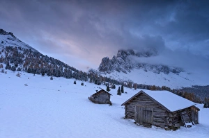 Winter Scene Prints: Pink clouds at dawn on the Odle and hut covered with snow, Malga Caseril, Funes Valley