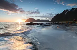 Photographing Prints: Pink clouds and midnight sun reflected on the waves of blue sea framed by rocky peaks