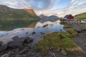 Rorbu Prints: Pink clouds and peaks are reflected in the clear sea at night time, Vengeren, Vagspollen