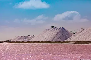 Salt Prints: Pink colored ocean overlooking the Salt Pyramids of Bonaire, Netherlands Antilles