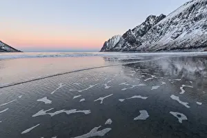 Pink Sky Prints: The pink light of sunrise over the waves of cold sea surrounded by snowy peaks, Ersfjord