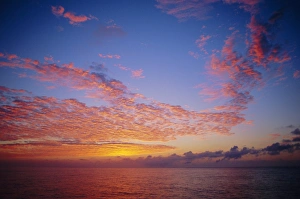 English Channel Prints: Pink and orange clouds at sunrise over the English Channel, England, UK