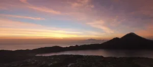 Pink panoramic sunrise from the top of Batur volcano, Bali, Indonesia, Southeast Asia