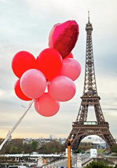 Love Prints: Pink and red balloons in front of Eiffel tower, Paris, France