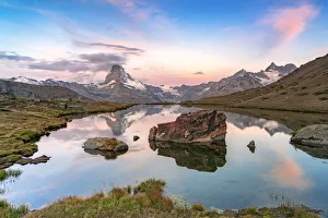 Ponds Prints: Pink sky at dawn over Matterhorn reflected in lake Stellisee, Zermatt, Valais Canton