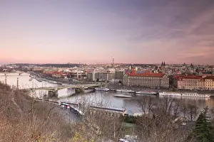 Motion Blur Prints: Pink sky on historical bridges and buildings reflected on Vltava River at sunset