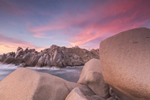 Province Of Sassari Prints: Pink sky at sunset frames the lighthouse on cliffs, Capo Testa, Santa Teresa di Gallura