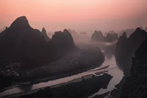 Guangxi Prints: Pink sunrise on the Li River and the famous Yangshuo mountains, Yangshuo, Guangxi, China
