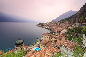 Onion Dome Prints: Pink sunrise lights up Lake Garda and the typical town of Limone Sul Garda