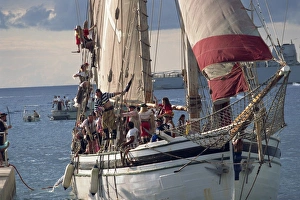 Cayman Islands Prints: Pirate ship full of pirates, for the start of Pirates Week, George Town