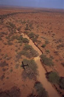 Images Dated 27th November 2007: Plane flying over sand river or lugga which may only flow with water a few days each year