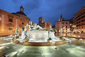Rituals Prints: Plaza de la Virgen and the Turia fountain and cathedral in the old town lit up at night