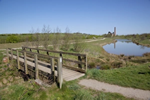Pleasley Colliery reflecting in pond, Derbyshire, England, United Kingdom, Europe