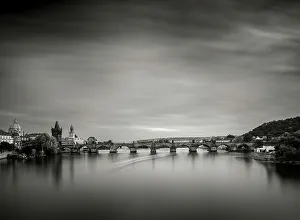 Vltava Prints: Pleasure cruiser moving beneath Charles Bridge, Prague, Czechia (Czech Republic), Europe