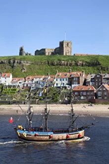 Ship Collection: Pleasure ship below Whitby Abbey and St. Marys Church, Whitby, North Yorkshire, Yorkshire