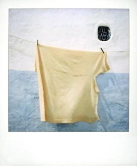 Blanket Prints: Polaroid image of blanket drying in the sun against