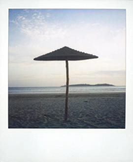 Photographic Techniques Prints: Polaroid image of brach parasol on deserted beach at dusk