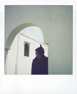 Photographic Techniques Prints: Polaroid image of man wearing traditional woolen djellaba