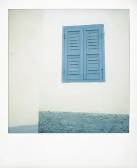 Photographic Techniques Prints: Polaroid of painted blue window shutter against whitewashed wall