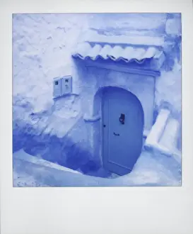 Photographic Techniques Prints: Polaroid of traditional painted blue door against bluewashed wall