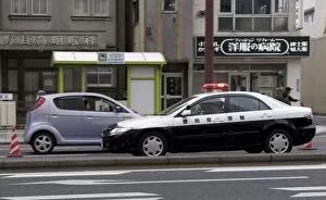 Images Dated 4th May 2009: A police car from Shizuoka Prefecture speeding past, Tokyo, Japan, Asia