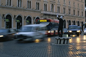 Buses Prints: Policeman in traffic duty in rush hour