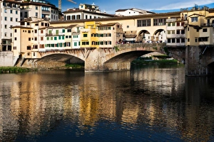 Ponte Vecchio reflected in the Arno River, Florence, UNESCO World Heritage Site, Tuscany