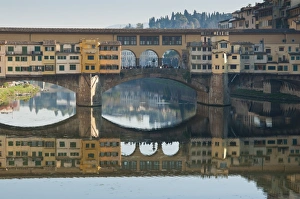 Ponte Vecchio reflected in the River Arno, Florence, UNESCO World Heritage Site