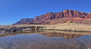 Vermilion Cliffs Prints: A pool of water reflecting the summit of Johnson Point below Vermilion Cliffs