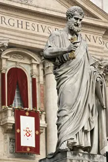 Popes balcony and statue of St. Peter outside St Peters Basilica