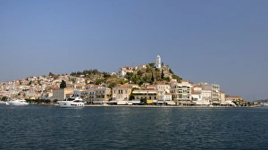 Poros town and harbour viewed from the sea, Poros island, Attica, Peloponnese, Greece