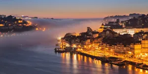 Cityscapes Prints: Porto at sunset with the sea fog rolling in, Porto, Portugal, Europe