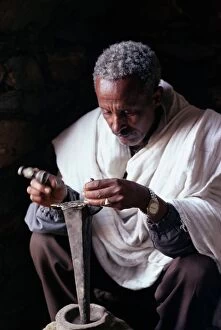 One Man Only Collection: Portrait of a blacksmith at work, town of Axoum (Axum) (Aksum), Tigre region