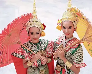 Portrait of two dancers in traditional Thai classical dance costume