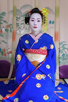 Kyoto Gallery: Portrait of a Geisha in a traditional Japanese style tatami mat room