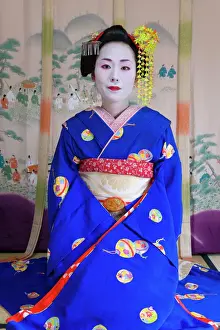 Identity Prints: Portrait of a Geisha in a traditional Japanese style tatami mat room
