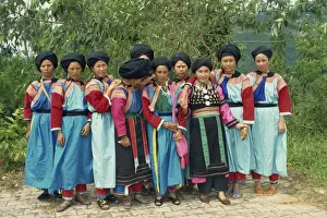35 40 Years Prints: Portrait of Lisu hill tribe women in traditional dress at Chiang Rai