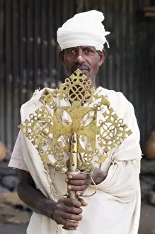 Gondar Prints: Portrait of a man holding a treasure from the Narga Selassie Christian church
