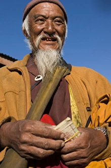 One Man Only Prints: Portrait of a monk doing his morning shopping, Paro, Bhutan, Asia